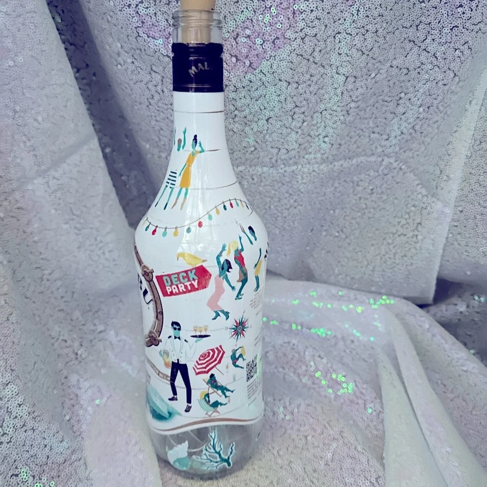 Bar back accent light, party accent or night light Malibu pink light bottle.